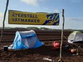 Tältar på en torvbrott som protest mot miljöbrottet